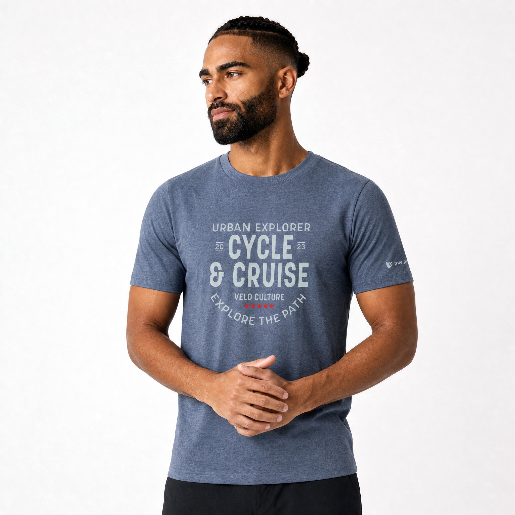 Man wearing a blue t-shirt with text on a white background