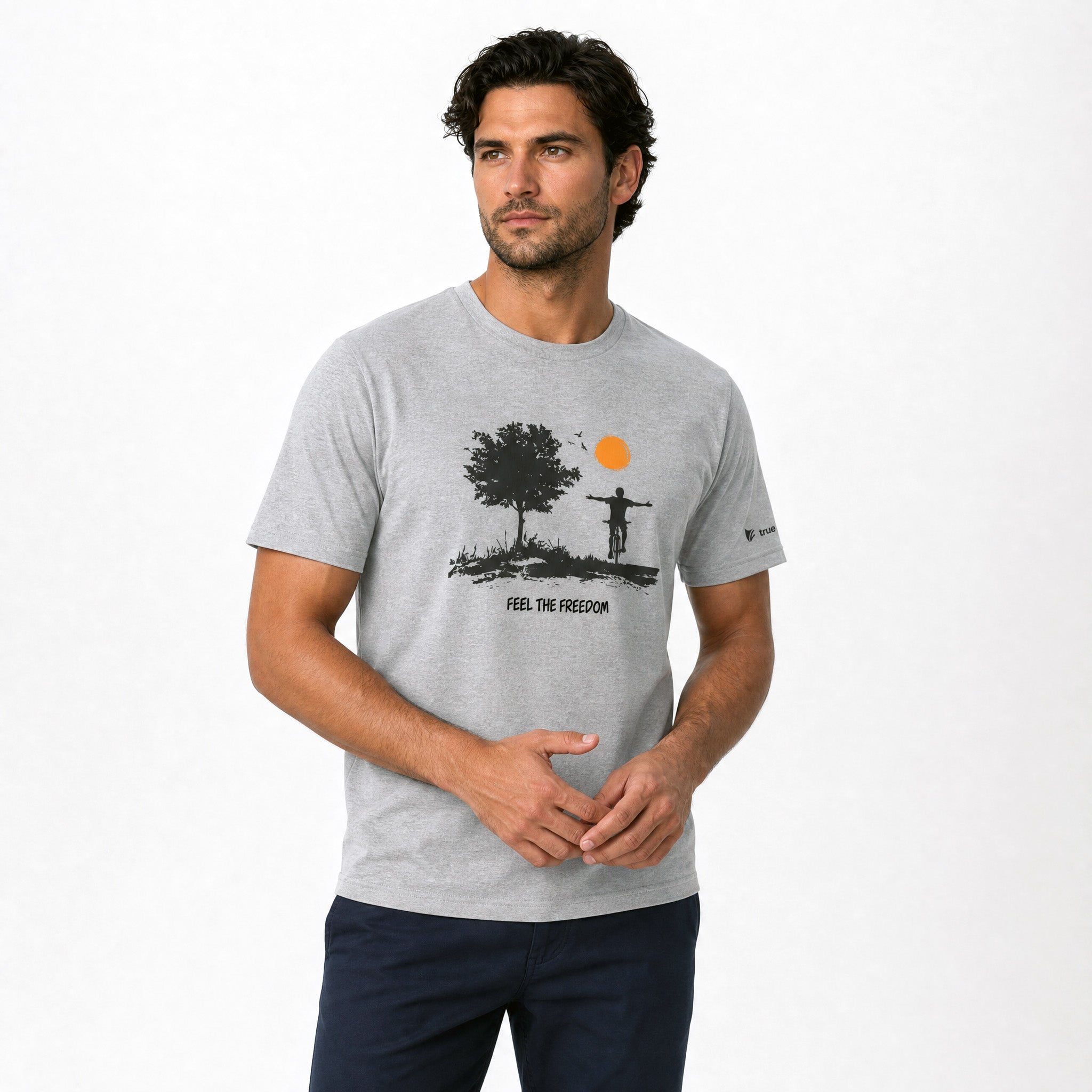 Man wearing a gray t-shirt with a graphic design and text on a white background