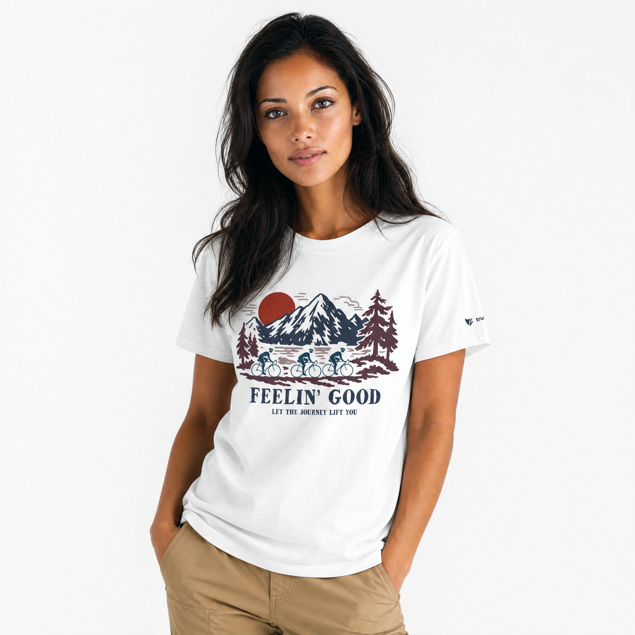 Woman wearing a white t-shirt with a nature graphic and text on a white background