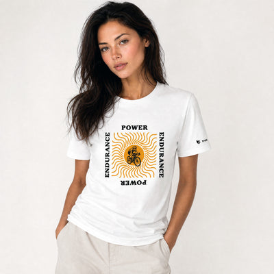 Woman wearing a white t-shirt with graphic design and text on a plain background