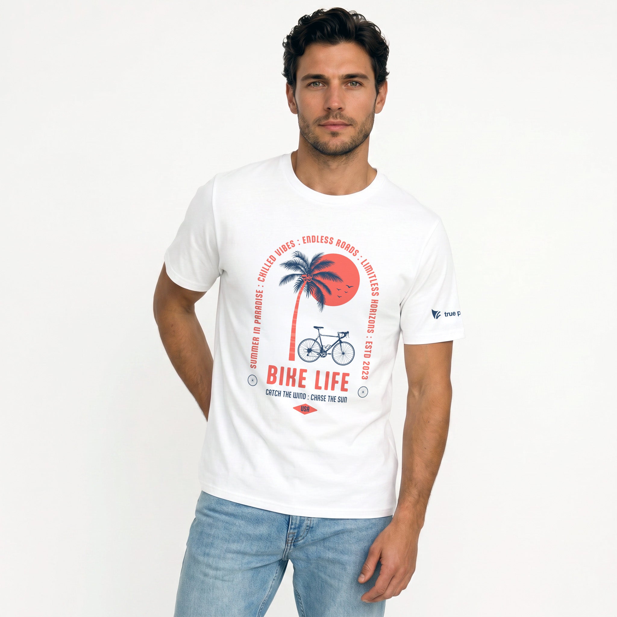 Man wearing a white t-shirt with 'Bike Life' graphic design on a plain background