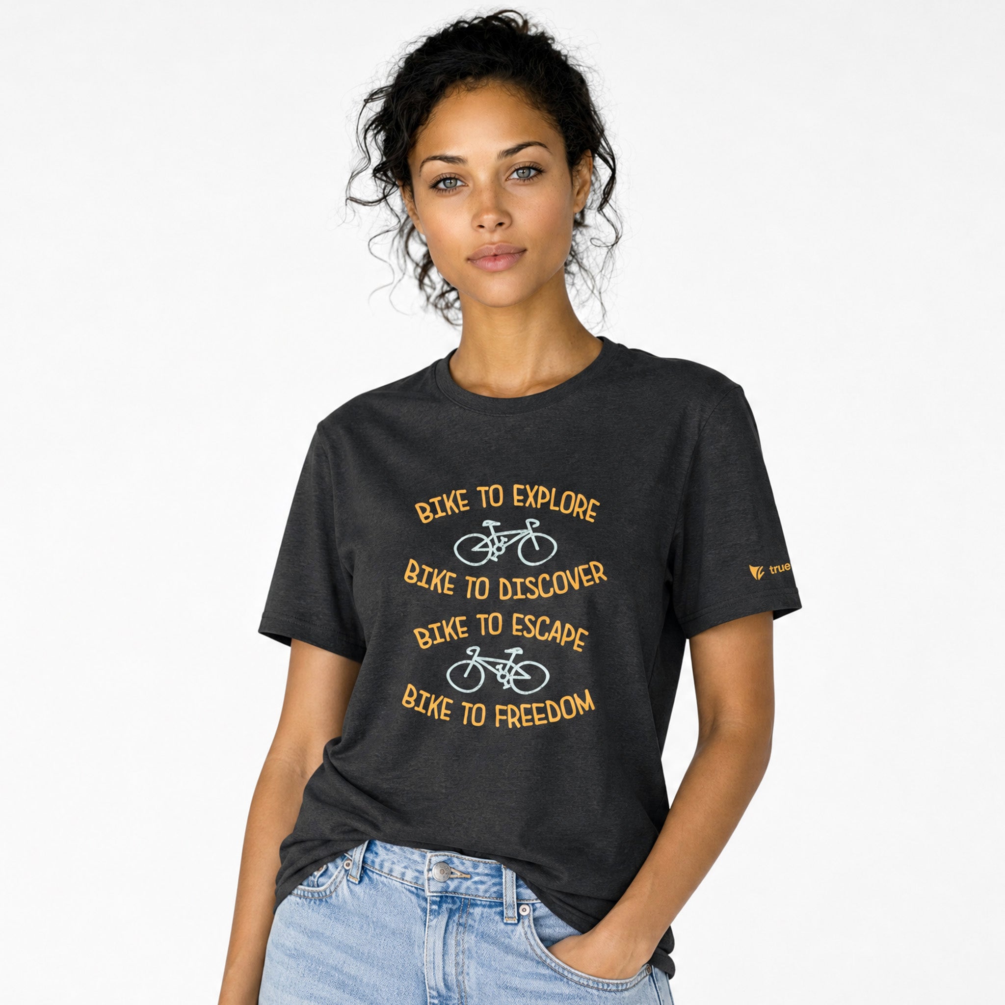 Woman wearing a black t-shirt with yellow text and bicycle graphics on a white background