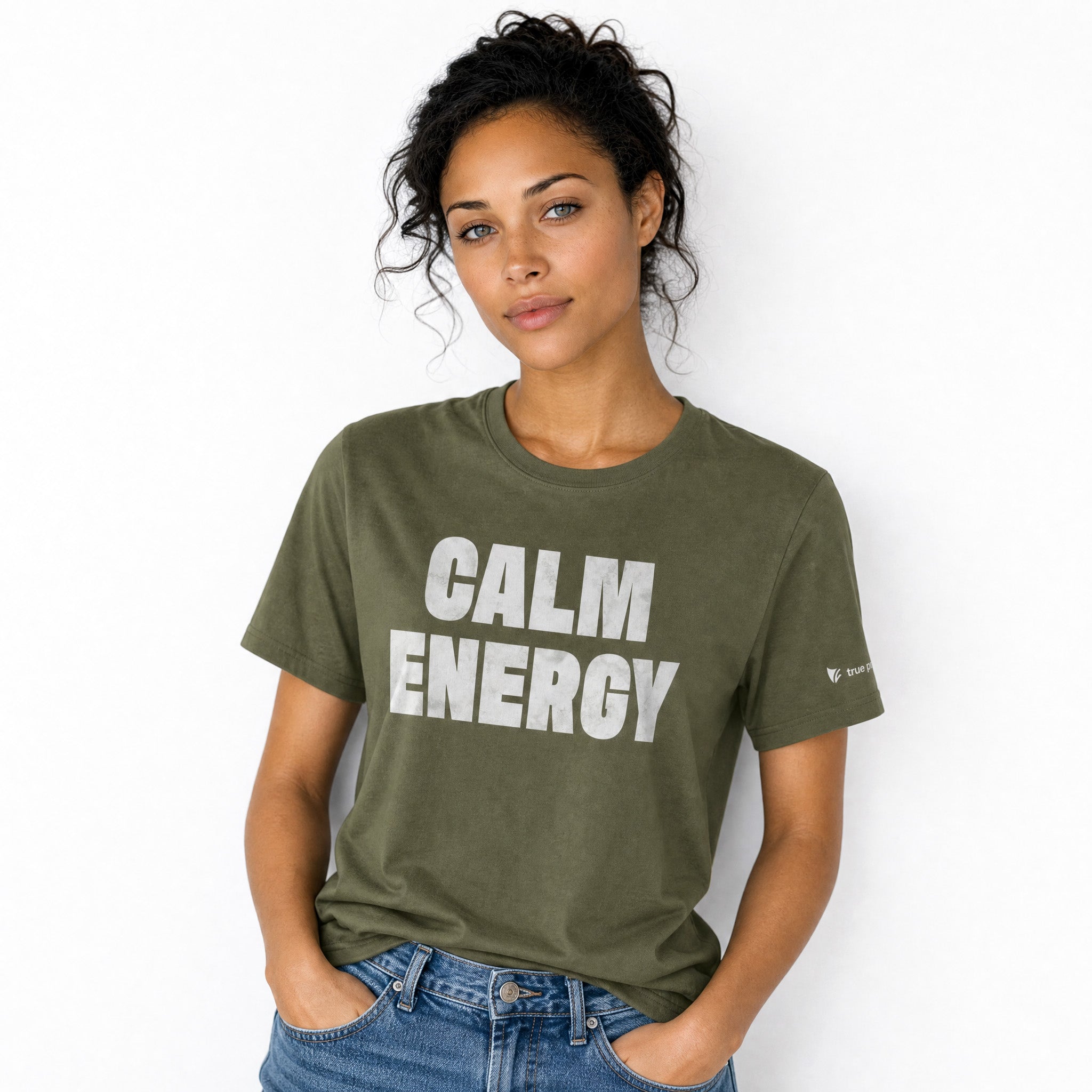 Person wearing a green t-shirt with 'CALM ENERGY' text on a white background