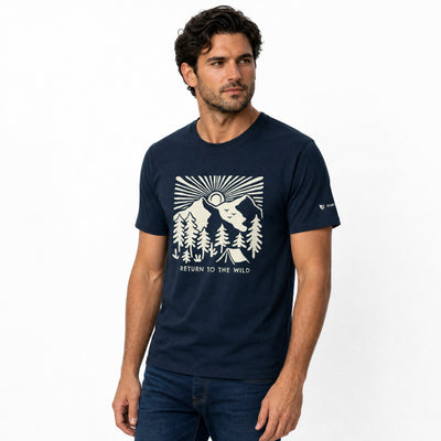 Man wearing a navy blue t-shirt with a graphic design on a white background