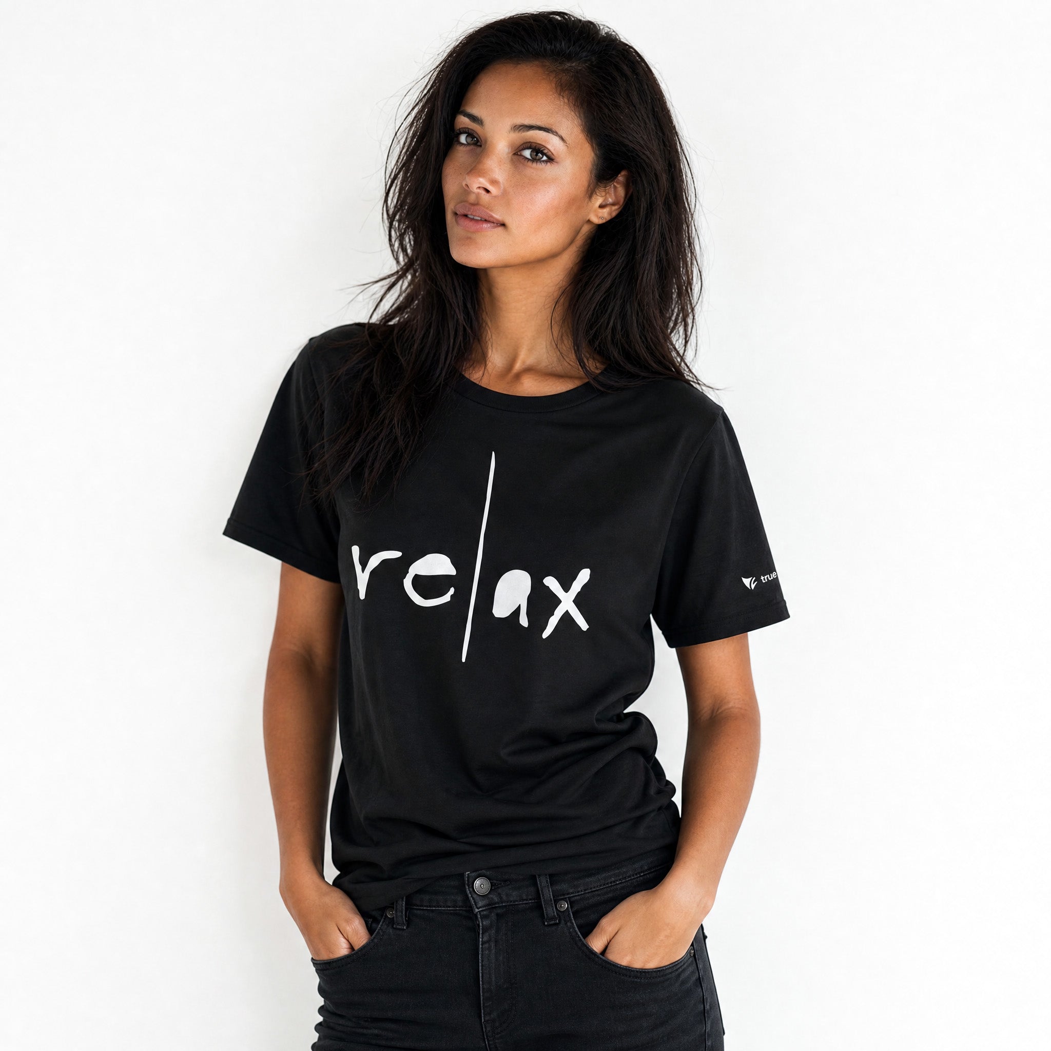 Woman wearing a black t-shirt with 'relax' text on a white background